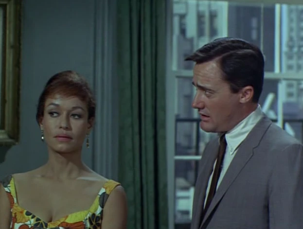 image of Mrs. Delgado giving a decidedly non-voodoo evil eye to her husband